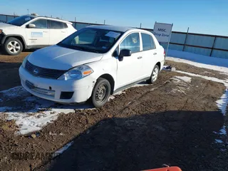 2010 Nissan Versa 1.6 with VIN 3N1CC1AP6AL385612, listed as a IAAI auction lot 41392745 with 195,521 mi miles. Bid and sale history available at carsss.com. Image 2.