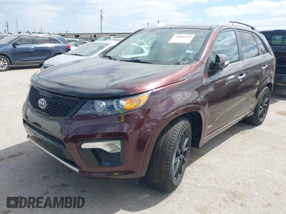 2012 Kia Sorento SX with VIN 5XYKWDA25CG249584, listed as a IAAI auction lot 42008349 with 214,381 mi miles. Bid and sale history available at carsss.com. Image 2.