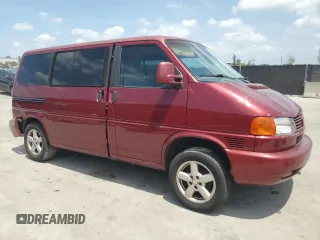 1999 Volkswagen EuroVan с VIN WV2MH2703XH045037, выставлен на аукционе Copart как лот 57109265 с пробегом 265 855 миль миль и Списание • Salvage title. История ставок и продаж доступна на DreamBid. Изображение 4.