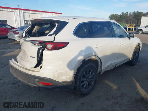 2021 Mazda CX-9 Touring with VIN JM3TCBCY1M0507696, listed as a IAAI auction lot 41681192 with 69,330 mi miles. Bid and sale history available at carsss.com. Image 4.