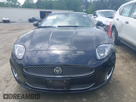 2012 Jaguar XK with VIN SAJWA4FB8CLB47049, listed as a IAAI auction lot 42118136 with 60,953 mi miles. Bid and sale history available at carsss.com. Image 6.