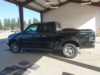 2002 Ford F-150 XLT with VIN 1FTRW08L92KD75087, listed as a IAAI auction lot 41960331 with 1 mi miles. Bid and sale history available at carsss.com. Image 14.