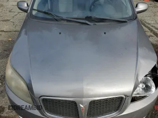 2009 Pontiac G3 z VIN KL2TD66E39B647536, wystawiony jako Copart lot #76592784 z przebiegiem 123 818 mil mil oraz Szkody całkowita. Historia ofert i sprzedaży dostępna na DreamBid. Obrazek 12.