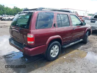 2002 Nissan Pathfinder SE z VIN JN8DR09Y52W737232, wystawiony jako IAAI lot #42381901 z przebiegiem 272 847 mil mil oraz . Historia ofert i sprzedaży dostępna na DreamBid. Obrazek 4.