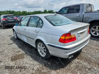 2004 BMW 3 Series 330xi with VIN WBAEW53464PG10935, listed as a Copart auction lot 63155905 with 165,240 mi miles and Clean title. Bid and sale history available at DreamBid. Image 2.