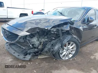 2016 Mazda Mazda6 i Sport with VIN JM1GJ1U56G1422012, listed as a IAAI auction lot 40693636 with 93,094 mi miles. Bid and sale history available at carsss.com. Image 6.