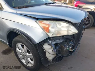2008 Honda CR-V EX with VIN 3CZRE38568G706370, listed as a IAAI auction lot 41031674 with 124,494 mi miles. Bid and sale history available at carsss.com. Image 14.