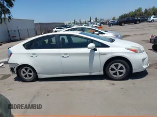 2015 Toyota Prius Four with VIN JTDKN3DU9F0475163, listed as a IAAI auction lot 42630828 with 158,095 mi miles and . Bid and sale history available at DreamBid. Image 13.