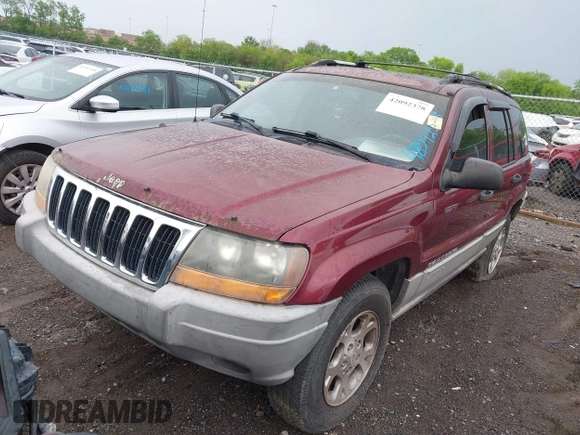 2000 Jeep Grand Cherokee Laredo z VIN 1J4GW48S5YC234942, wystawiony jako IAAI lot #42092378 z przebiegiem 235 168 mil mil oraz . Historia ofert i sprzedaży dostępna na DreamBid. Obrazek 2.