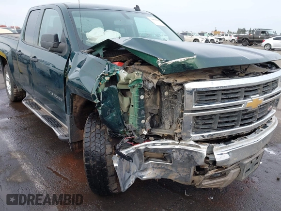2014 Chevrolet Silverado 1500 LT with VIN 1GCVKREC7EZ312679, listed as a IAAI auction lot 40874395 with 153,234 mi miles and . Bid and sale history available at DreamBid. Image 6.