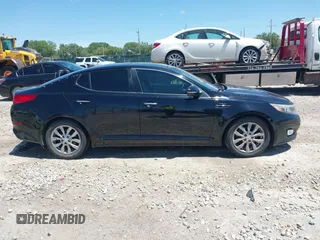 2015 Kia Optima EX z VIN 5XXGN4A76FG353935, wystawiony jako IAAI lot #42292395 z przebiegiem 161 085 mil mil oraz . Historia ofert i sprzedaży dostępna na DreamBid. Obrazek 14.