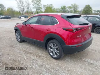 2023 Mazda CX-30 S Premium with VIN 3MVDMBDM3PM511402, listed as a IAAI auction lot 42180001 with 6,189 mi miles and . Bid and sale history available at DreamBid. Image 3.