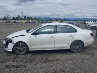 2016 Volkswagen Jetta Sport z VIN 3VWD17AJ3GM216976, wystawiony jako IAAI lot #42012643 z przebiegiem 145 795 mil mil oraz . Historia ofert i sprzedaży dostępna na DreamBid. Obrazek 14.