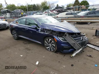 2019 Volkswagen Arteon SEL Premium R-Line z VIN WVWTR7AN3KE000652, wystawiony jako Copart lot #68808043 z przebiegiem 22 408 mil mil oraz . Historia ofert i sprzedaży dostępna na DreamBid. Obrazek 4.
