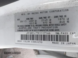 2014 Mazda 3 i Touring with VIN JM1BM1L77E1117166, listed as a IAAI auction lot 41336048 with 88,808 mi miles and . Bid and sale history available at DreamBid. Image 9.