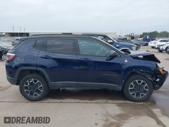 2019 Jeep Compass Trailhawk with VIN 3C4NJDDB8KT619330, listed as a IAAI auction lot 41237920 with 85,144 mi miles and . Bid and sale history available at DreamBid. Image 13.