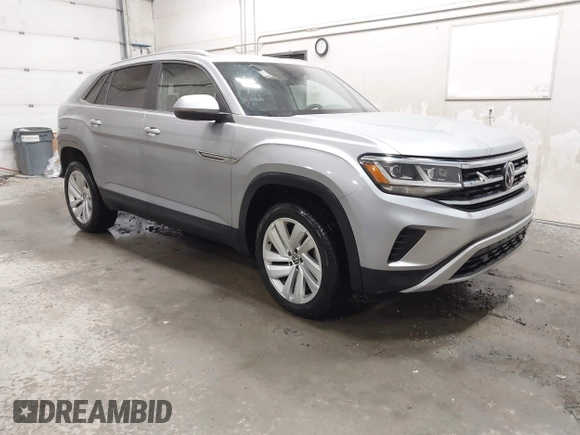 2023 Volkswagen Atlas SE z VIN 1V2KC2CA6PC210593, wystawiony jako IAAI lot #41957633 z przebiegiem 34 801 mil mil oraz . Historia ofert i sprzedaży dostępna na DreamBid. Obrazek 1.