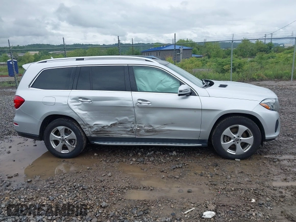 2018 Mercedes-Benz GLS 450 z VIN 4JGDF6EE1JB055629, wystawiony jako IAAI lot #42279679 z przebiegiem 61 447 mil mil oraz . Historia ofert i sprzedaży dostępna na DreamBid. Obrazek 13.