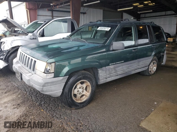 1997 Jeep Grand Cherokee TSi with VIN 1J4FX58S6VC602782, listed as a Copart auction lot 86605074 with 158,971 mi miles and Salvage Title. Bid and sale history available at carsss.com. Image 1.