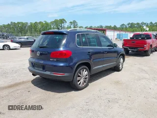 2012 Volkswagen Tiguan SEL with VIN WVGAV7AX7CW608637, listed as a IAAI auction lot 42173987 with 149,013 mi miles and . Bid and sale history available at DreamBid. Image 4.