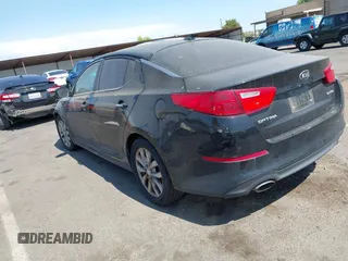 2015 Kia Optima EX z VIN 5XXGN4A75FG420329, wystawiony jako IAAI lot #42574401 z przebiegiem 223 816 mil mil oraz . Historia ofert i sprzedaży dostępna na DreamBid. Obrazek 3.