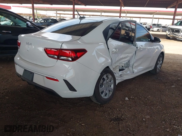 2023 Kia Rio S with VIN 3KPA24AD0PE616497, listed as a IAAI auction lot 41883848 with 8,717 mi miles. Bid and sale history available at carsss.com. Image 4.