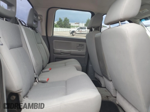 2006 Dodge Dakota SLT z VIN 1D7HW48N56S641575, wystawiony jako Copart lot #60141125 z przebiegiem 135 482 mil mil oraz Szkoda całkowita • Salvage title. Historia ofert i sprzedaży dostępna na DreamBid. Obrazek 10.