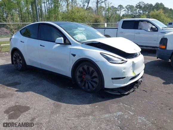 2022 Tesla Model Y Performance with VIN 7SAYGDEF2NF379209, listed as a IAAI auction lot 41917918 with 34,166 mi miles. Bid and sale history available at carsss.com. Image 1.
