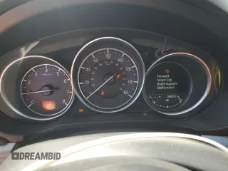2018 Mazda CX-5 Touring z VIN JM3KFBCM2J1363310, wystawiony jako Copart lot #58969135 z przebiegiem 86 831 mil mil oraz Szkoda całkowita • Salvage title. Historia ofert i sprzedaży dostępna na DreamBid. Obrazek 9.