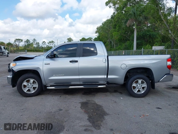 2017 Toyota Tundra SR5 z VIN 5TFRW5F10HX221961, wystawiony jako IAAI lot #42178312 z przebiegiem 54 904 mil mil oraz . Historia ofert i sprzedaży dostępna na DreamBid. Obrazek 14.