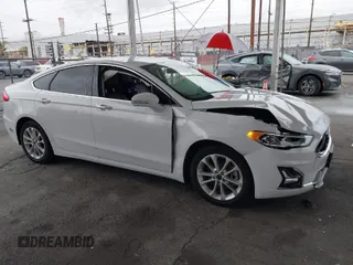 2019 Ford Fusion Energi Titanium with VIN 3FA6P0SU3KR251786, listed as a IAAI auction lot 41798809 with 58,186 mi miles. Bid and sale history available at carsss.com. Image 1.