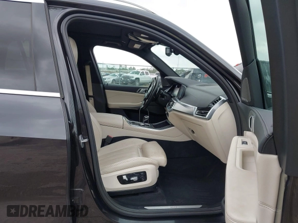 2021 BMW X5 xDrive45e with VIN 5UXTA6C02M9F88978, listed as a IAAI auction lot 42201563 with 23,339 mi miles and . Bid and sale history available at DreamBid. Image 5.