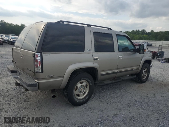 2000 Chevrolet Tahoe Z71 with VIN 1GNEK13R7YR189177, listed as a Copart auction lot 56830725 with 308,270 mi miles and Salvage title. Bid and sale history available at DreamBid. Image 3.
