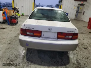 1999 Lexus ES 300 Luxury Sport Sdn with VIN JT8BF28G0X0233986, listed as a Copart auction lot 82440944 with 129,656 mi miles and Salvage Title. Bid and sale history available at carsss.com. Image 6.