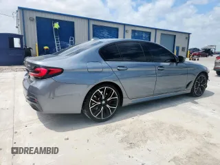 2022 BMW 5 Series 530i with VIN WBA53BH00NWX59634, listed as a Copart auction lot 61598505 with 69,130 mi miles and Salvage title. Bid and sale history available at DreamBid. Image 3.
