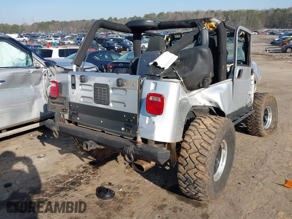 2006 Jeep Wrangler Unlimited LWB with VIN 1J4FA44S76P755148, listed as a IAAI auction lot 41774840 with 167,914 mi miles. Bid and sale history available at carsss.com. Image 4.