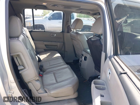 2013 Honda Pilot Touring with VIN 5FNYF3H95DB032438, listed as a IAAI auction lot 41865938 with 298,973 mi miles and . Bid and sale history available at DreamBid. Image 8.