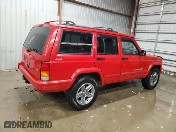 2001 Jeep Cherokee Sport with VIN 1J4FF58S01L519670, listed as a Copart auction lot 84340454 with 132,584 mi miles and Clean title. Bid and sale history available at DreamBid. Image 3.