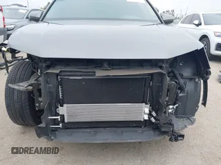 2020 Audi Q3 Premium z VIN WA1AECF32L1061271, wystawiony jako IAAI lot #42038795 z przebiegiem 23 902 mil mil oraz . Historia ofert i sprzedaży dostępna na DreamBid. Obrazek 6.