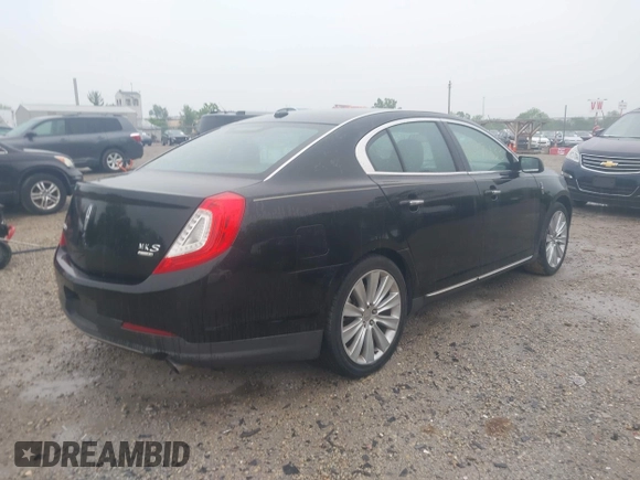 2013 Lincoln MKS EcoBoost with VIN 1LNHL9FT4DG607785, listed as a IAAI auction lot 42279833 with 126,548 mi miles and . Bid and sale history available at DreamBid. Image 4.