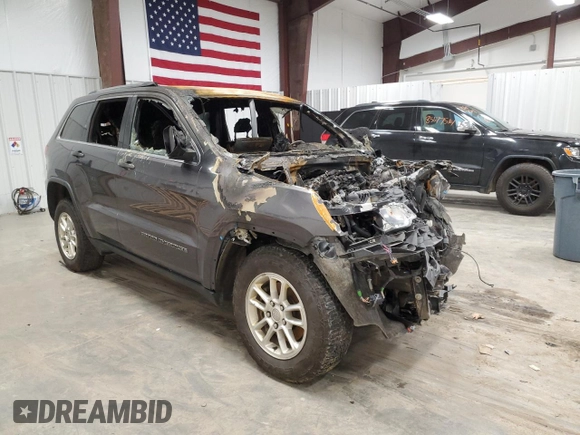 2019 Jeep Grand Cherokee Laredo E with VIN 1C4RJFAG9KC608636, listed as a Copart auction lot 87219014 with 0 mi miles and Salvage Title. Bid and sale history available at carsss.com. Image 4.