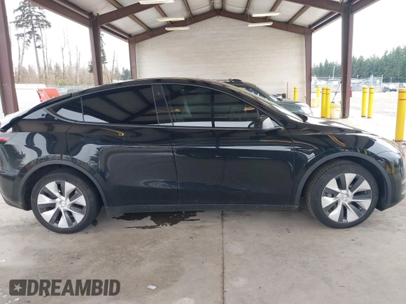 2023 Tesla Model Y Long Range with VIN 7SAYGDEE4PF789102, listed as a IAAI auction lot 41788860 with 88,457 mi miles and . Bid and sale history available at DreamBid. Image 13.