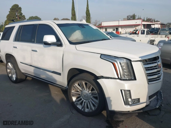 2016 Cadillac Escalade Platinum with VIN 1GYS4DKJ5GR260260, listed as a IAAI auction lot 41476668 with 108,058 mi miles. Bid and sale history available at carsss.com. Image 1.