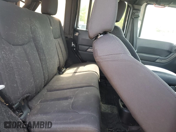 2015 Jeep Wrangler Unlimited Freedom с VIN 1C4BJWDG1FL609850, выставлен на аукционе Copart как лот 55169065 с пробегом 97 415 миль миль и Чистый • Clean title. История ставок и продаж доступна на DreamBid. Изображение 11.
