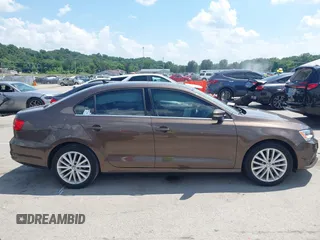 2015 Volkswagen Jetta SE with VIN 3VWD07AJ0FM214295, listed as a IAAI auction lot 42593549 with 62,720 mi miles and . Bid and sale history available at DreamBid. Image 12.