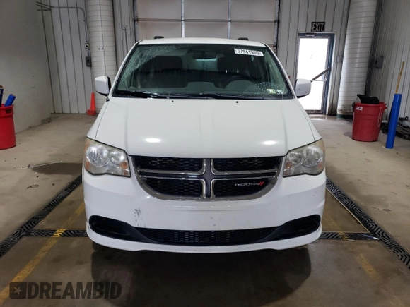 2014 Dodge Grand Caravan SXT z VIN 2C4RDGCGXER138025, wystawiony jako Copart lot #57941985 z przebiegiem 87 055 mil mil oraz Szkody całkowita. Historia ofert i sprzedaży dostępna na DreamBid. Obrazek 5.