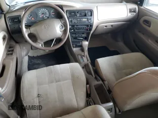 1997 Toyota Corolla with VIN 1NXBA02E4VZ577026, listed as a Copart auction lot 66184515 with 201,324 mi miles and Clean title. Bid and sale history available at DreamBid. Image 8.