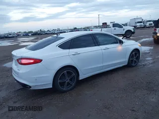 2014 Ford Fusion SE with VIN 3FA6P0H94ER198071, listed as a IAAI auction lot 41911338 with 114,764 mi miles. Bid and sale history available at carsss.com. Image 4.
