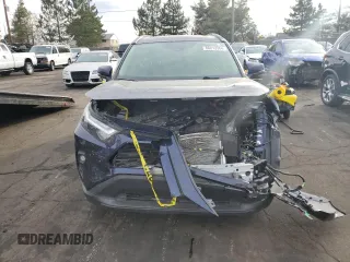 2024 Toyota RAV4 Hybrid XLE Premium with VIN JTMB6RFV4RD137902, listed as a Copart auction lot 86013364 with 9,330 mi miles and Salvage Title. Bid and sale history available at DreamBid. Image 5.
