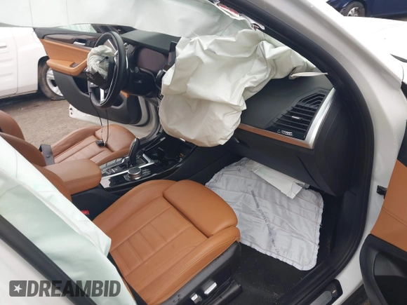 2021 BMW X3 sDrive30i z VIN 5UXTY3C01M9H84842, wystawiony jako IAAI lot #41971344 z przebiegiem 37 126 mil mil oraz . Historia ofert i sprzedaży dostępna na DreamBid. Obrazek 5.